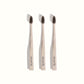 stylish stone coloured toothbrushes with black bristles